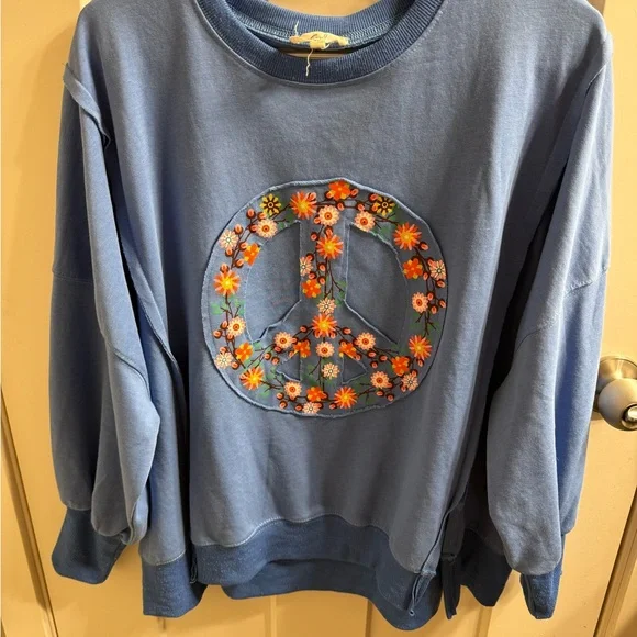 Easel Blue Top with Vibrant Floral Peace Sign Design - Picture 2 of 12